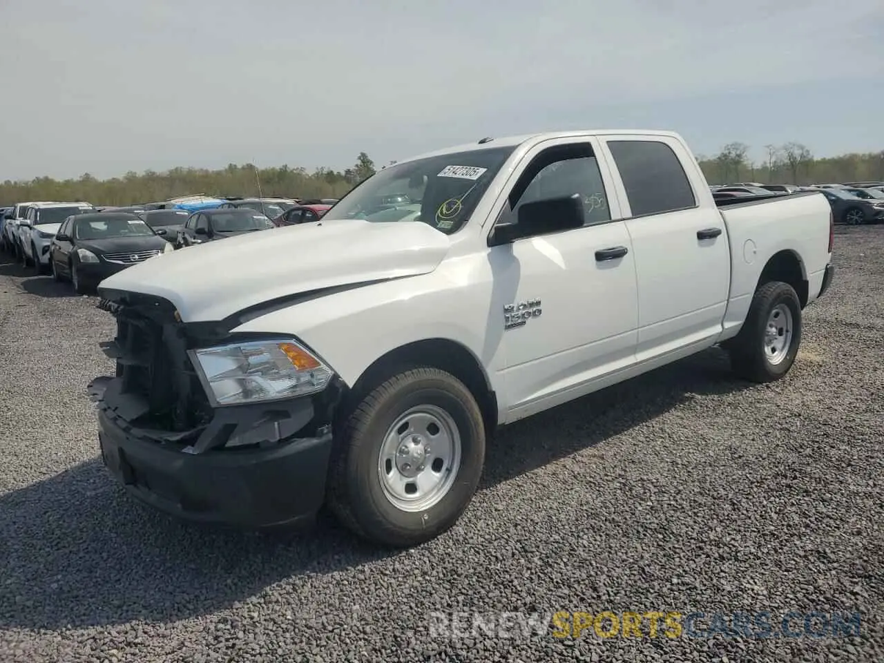 1 Photograph of a damaged car 3C6RR6KG6NG205875 RAM 1500 2022