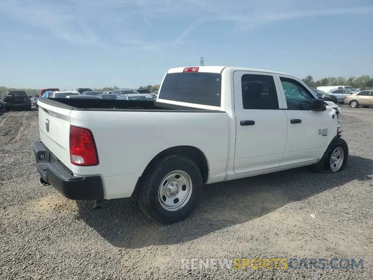 3 Photograph of a damaged car 3C6RR6KG6NG205875 RAM 1500 2022