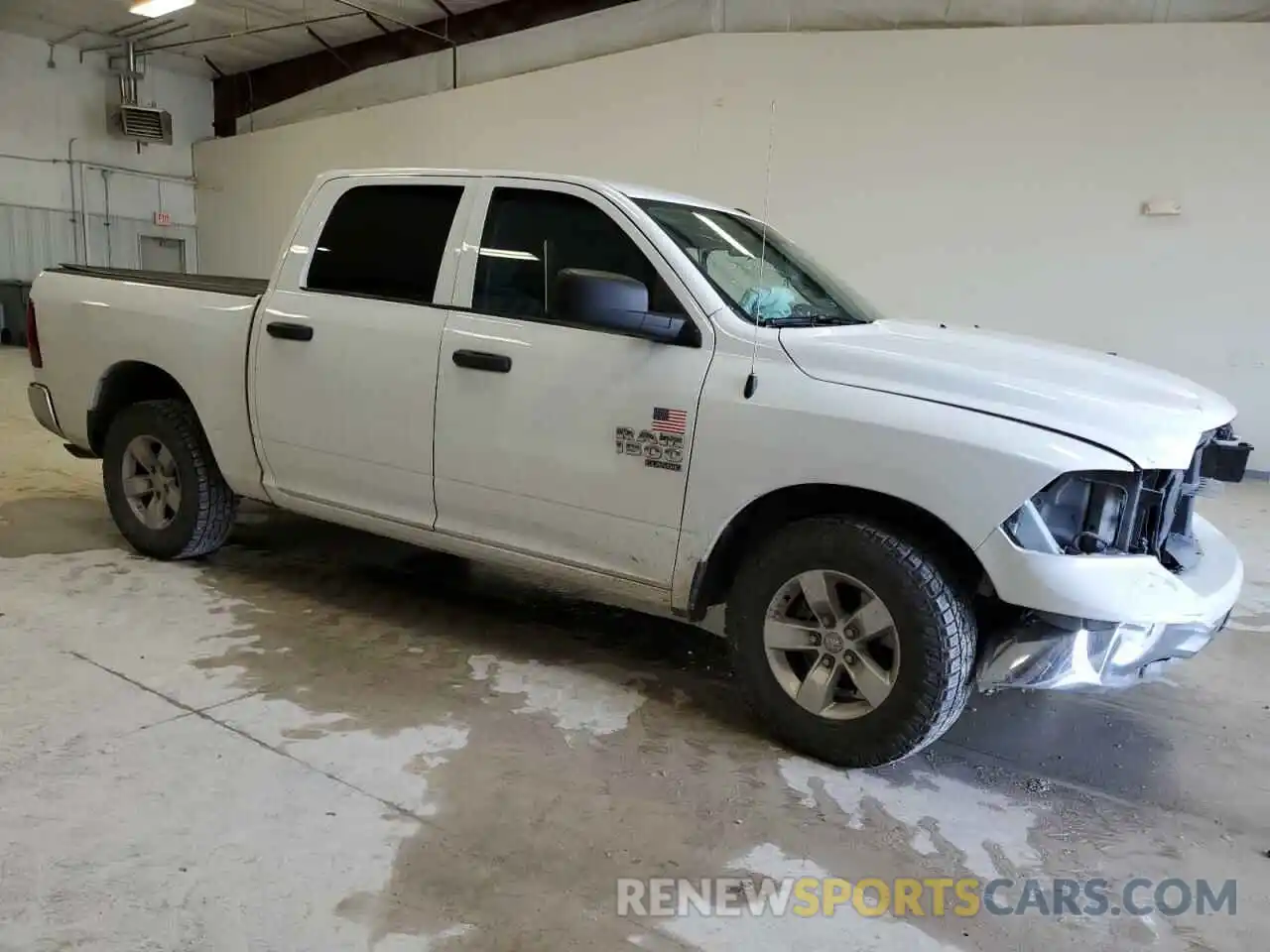 4 Photograph of a damaged car 3C6RR6KG6NG210865 RAM 1500 2022