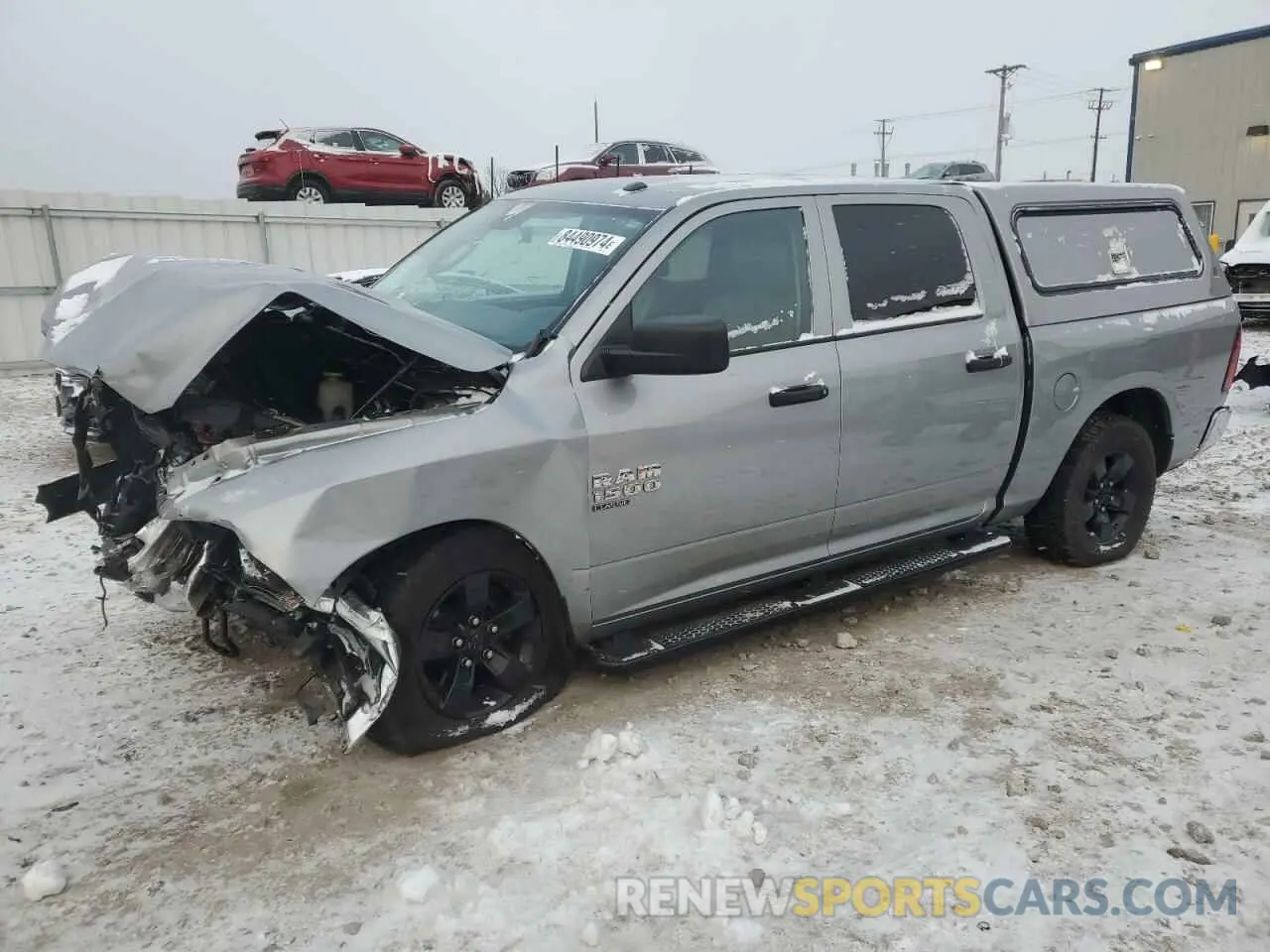 1 Photograph of a damaged car 3C6RR7KG1NG310765 RAM 1500 2022