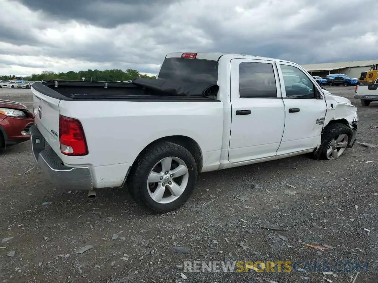 3 Photograph of a damaged car 3C6RR7KG7NG211349 RAM 1500 2022