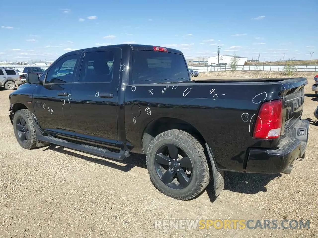 2 Photograph of a damaged car 3C6RR7KT1NG358425 RAM 1500 2022