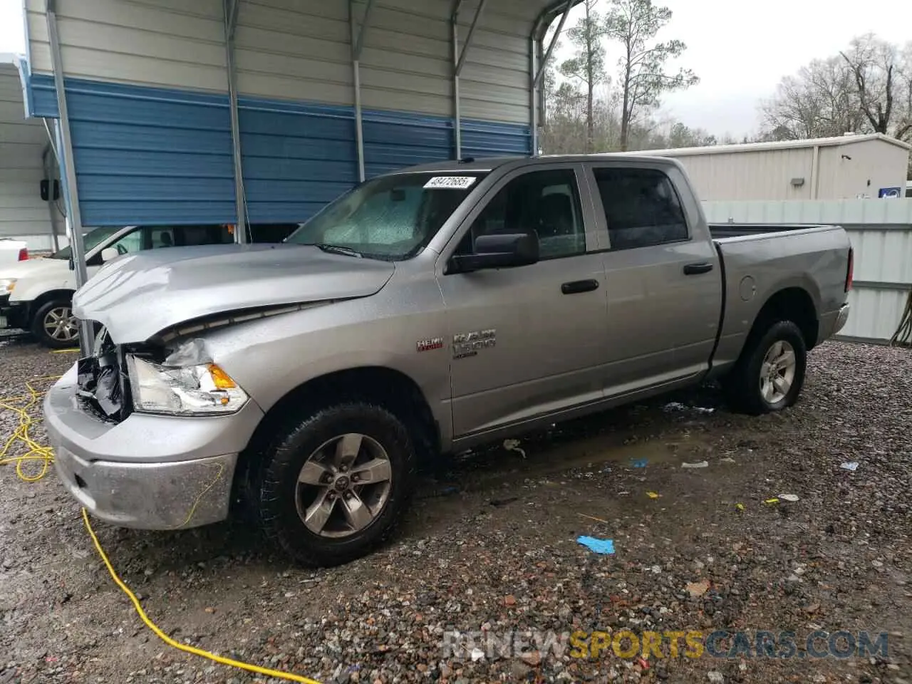 1 Photograph of a damaged car 3C6RR7KT5NG173861 RAM 1500 2022
