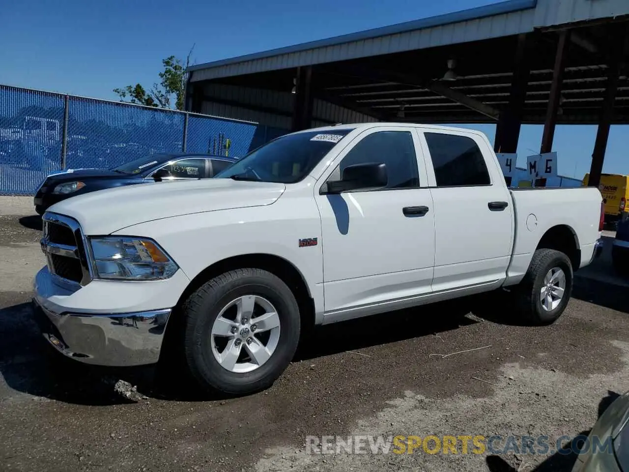 1 Photograph of a damaged car 3C6RR7KT6NG348246 RAM 1500 2022