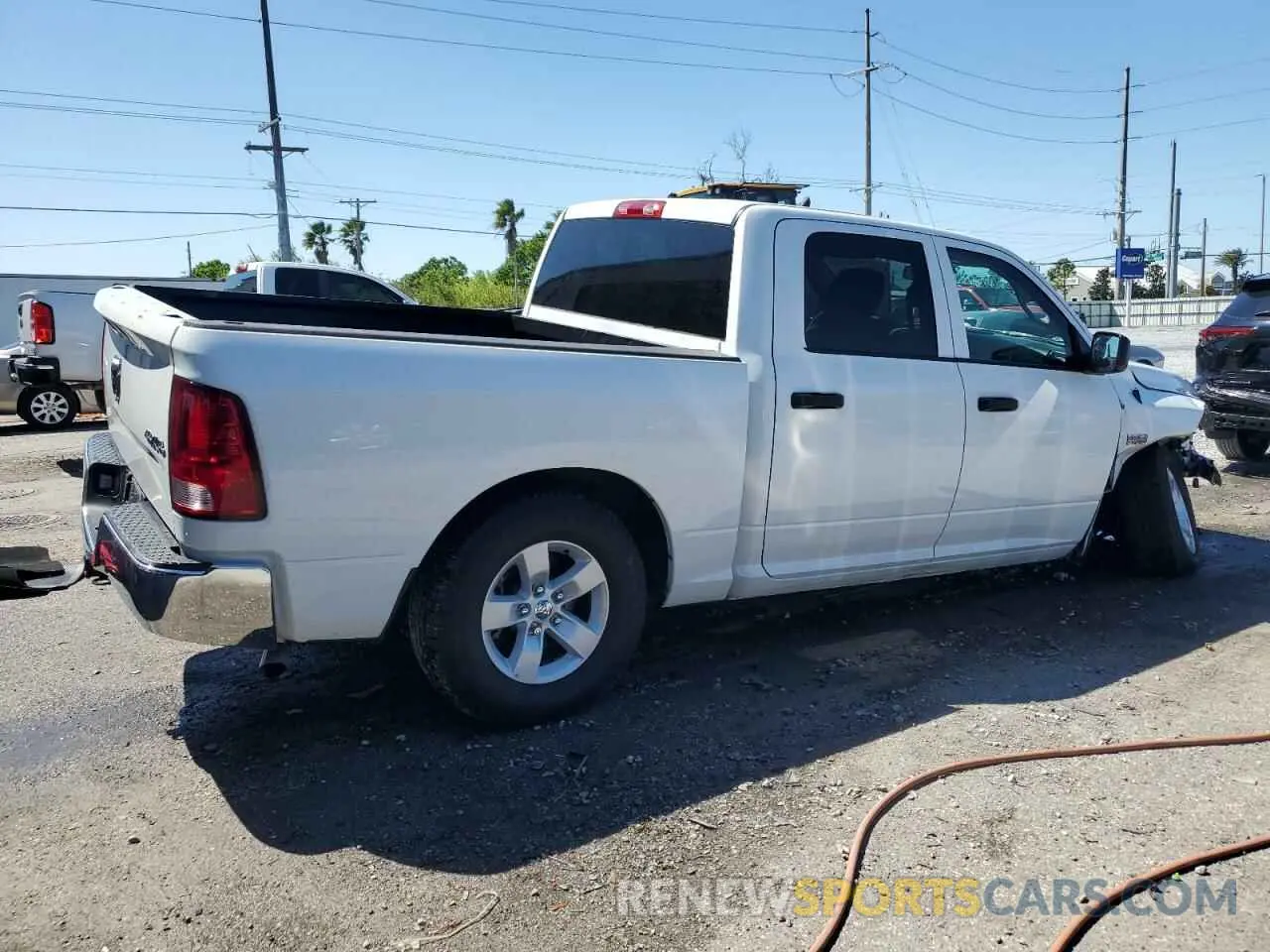 3 Photograph of a damaged car 3C6RR7KT6NG348246 RAM 1500 2022