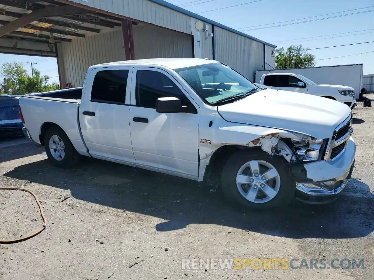 4 Photograph of a damaged car 3C6RR7KT6NG348246 RAM 1500 2022