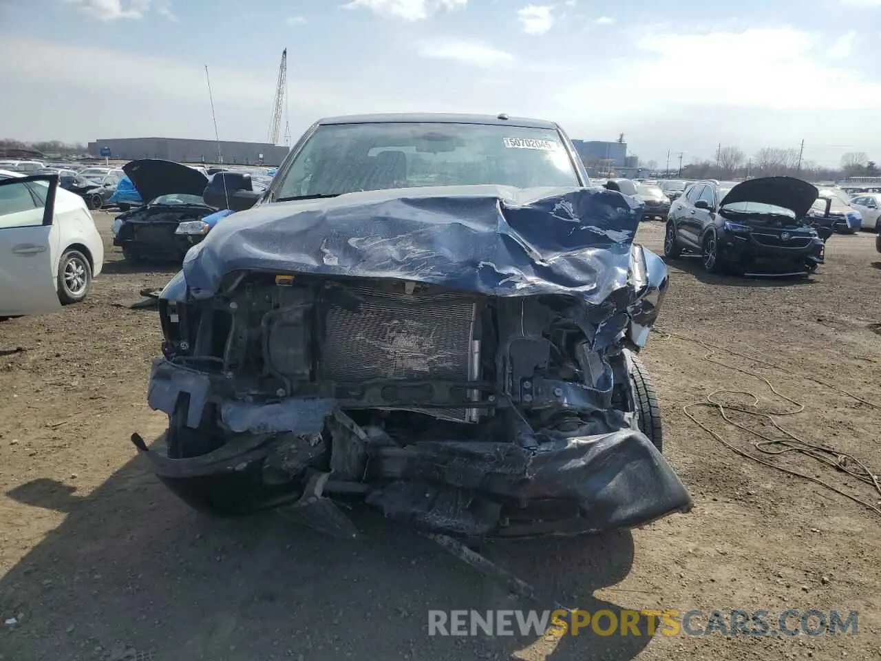 5 Photograph of a damaged car 3C6RR7KT6NG352815 RAM 1500 2022