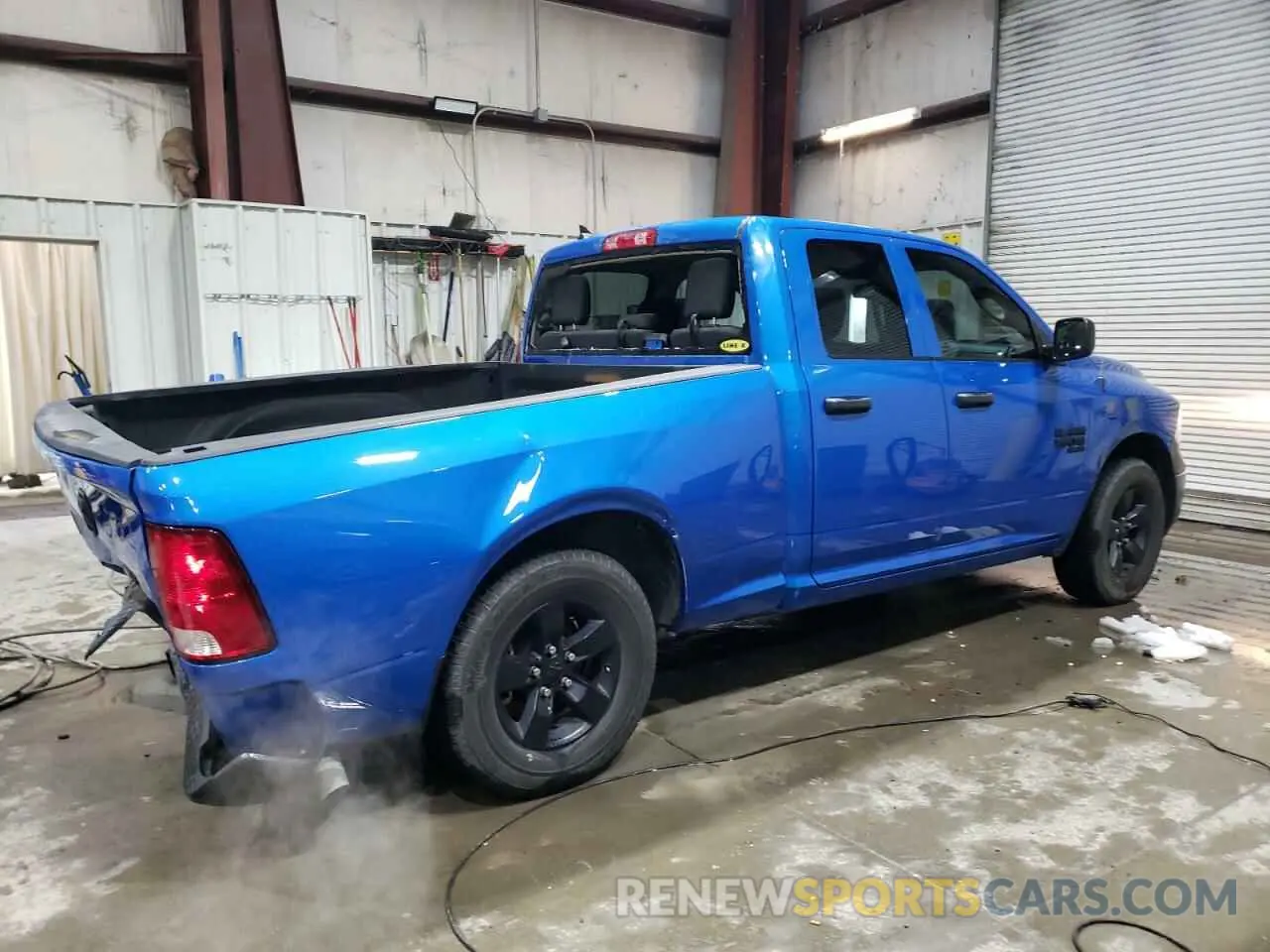 3 Photograph of a damaged car 1C6RR6FG6PS554606 RAM 1500 2023