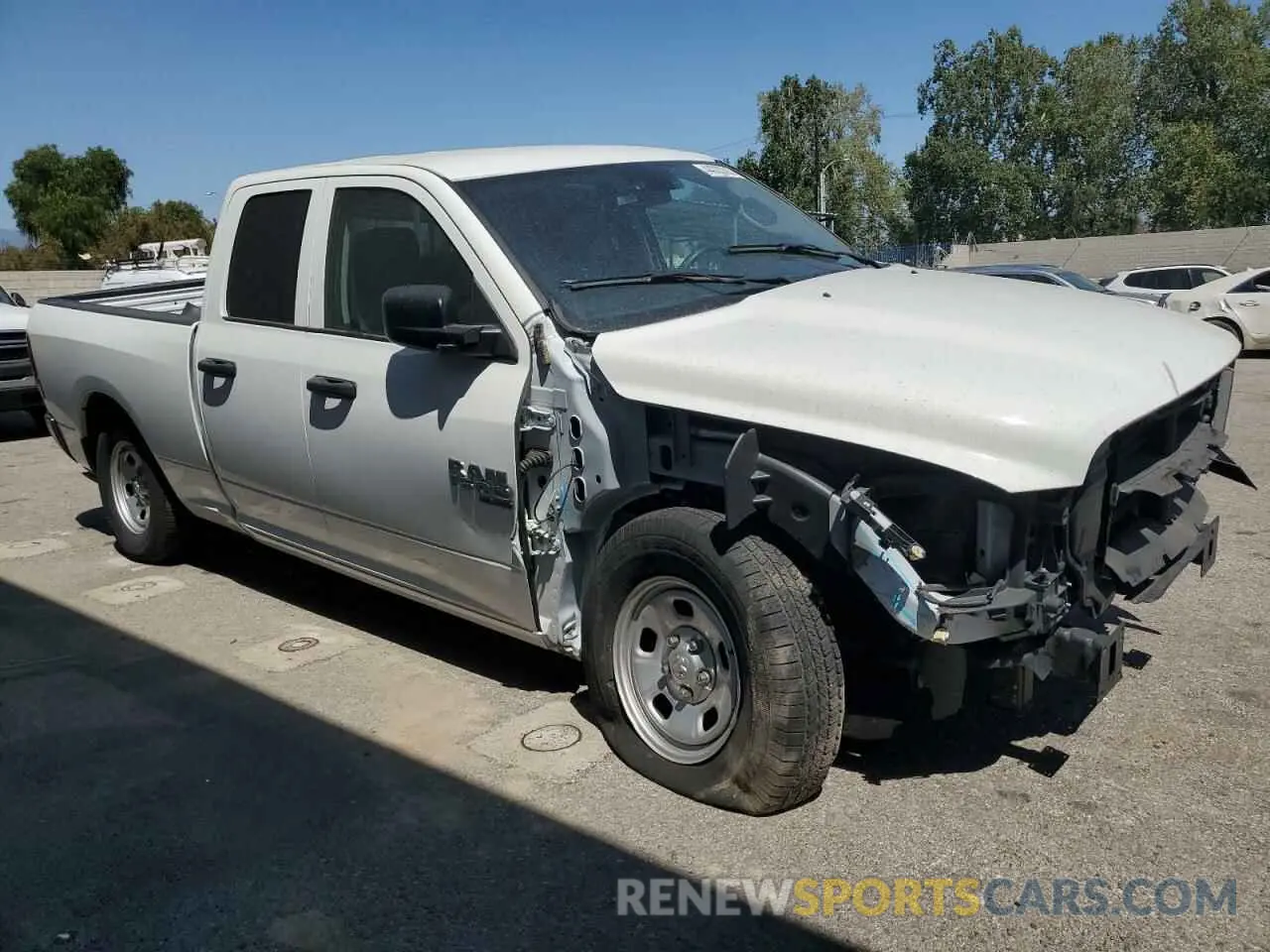 4 Photograph of a damaged car 1C6RR6FG9PS534852 RAM 1500 2023