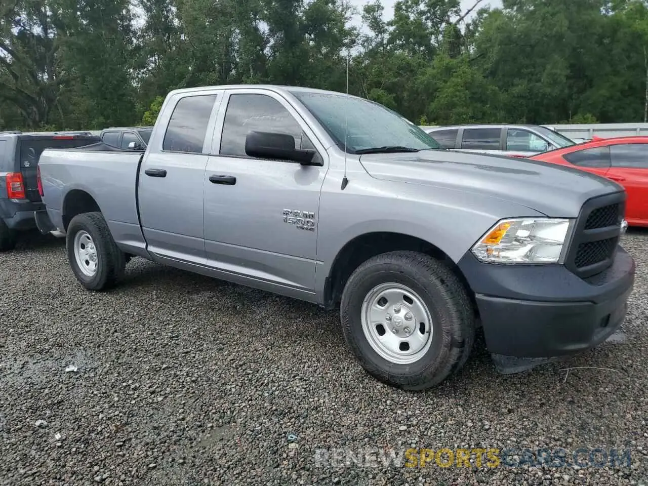 4 Photograph of a damaged car 1C6RR6FG9PS594310 RAM 1500 2023