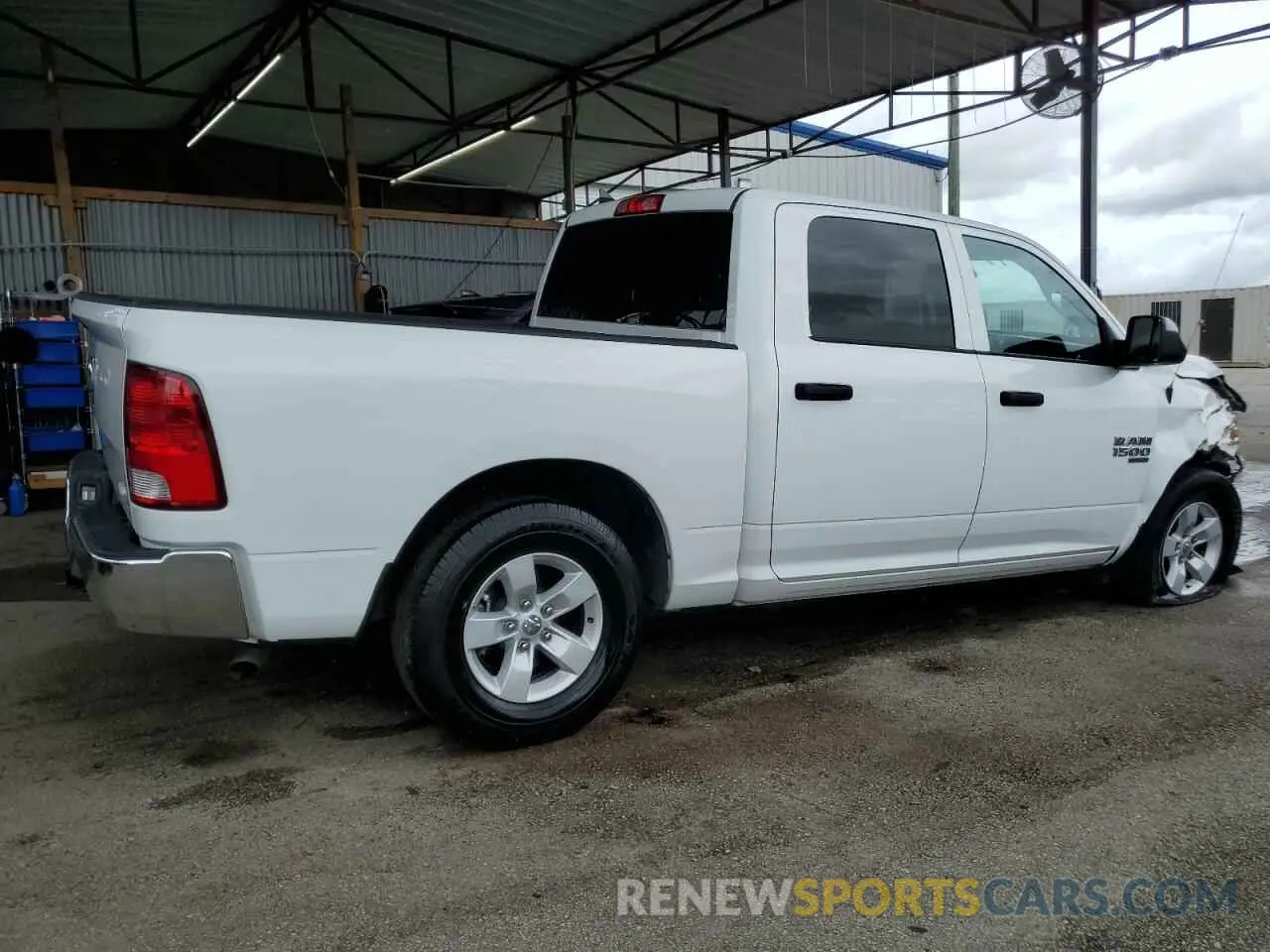 3 Photograph of a damaged car 1C6RR6LG6PS580210 RAM 1500 2023