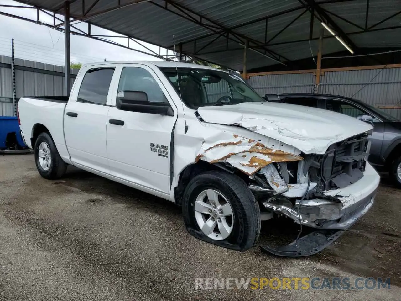 4 Photograph of a damaged car 1C6RR6LG6PS580210 RAM 1500 2023