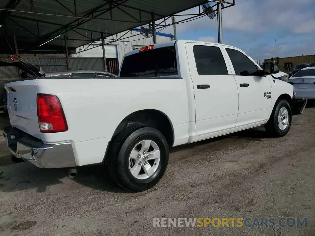 3 Photograph of a damaged car 1C6RR6LG7PS533834 RAM 1500 2023