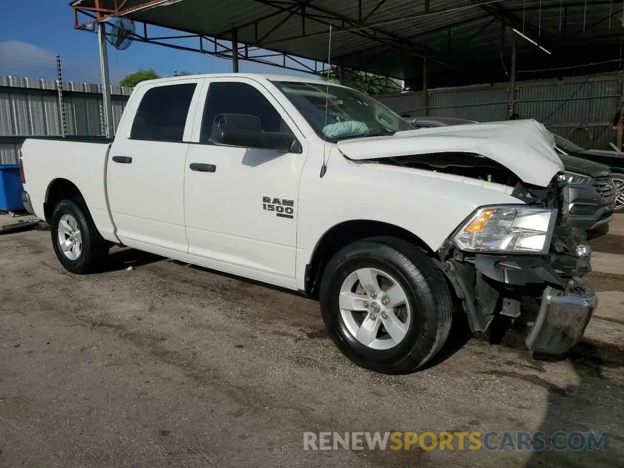4 Photograph of a damaged car 1C6RR6LG7PS533834 RAM 1500 2023