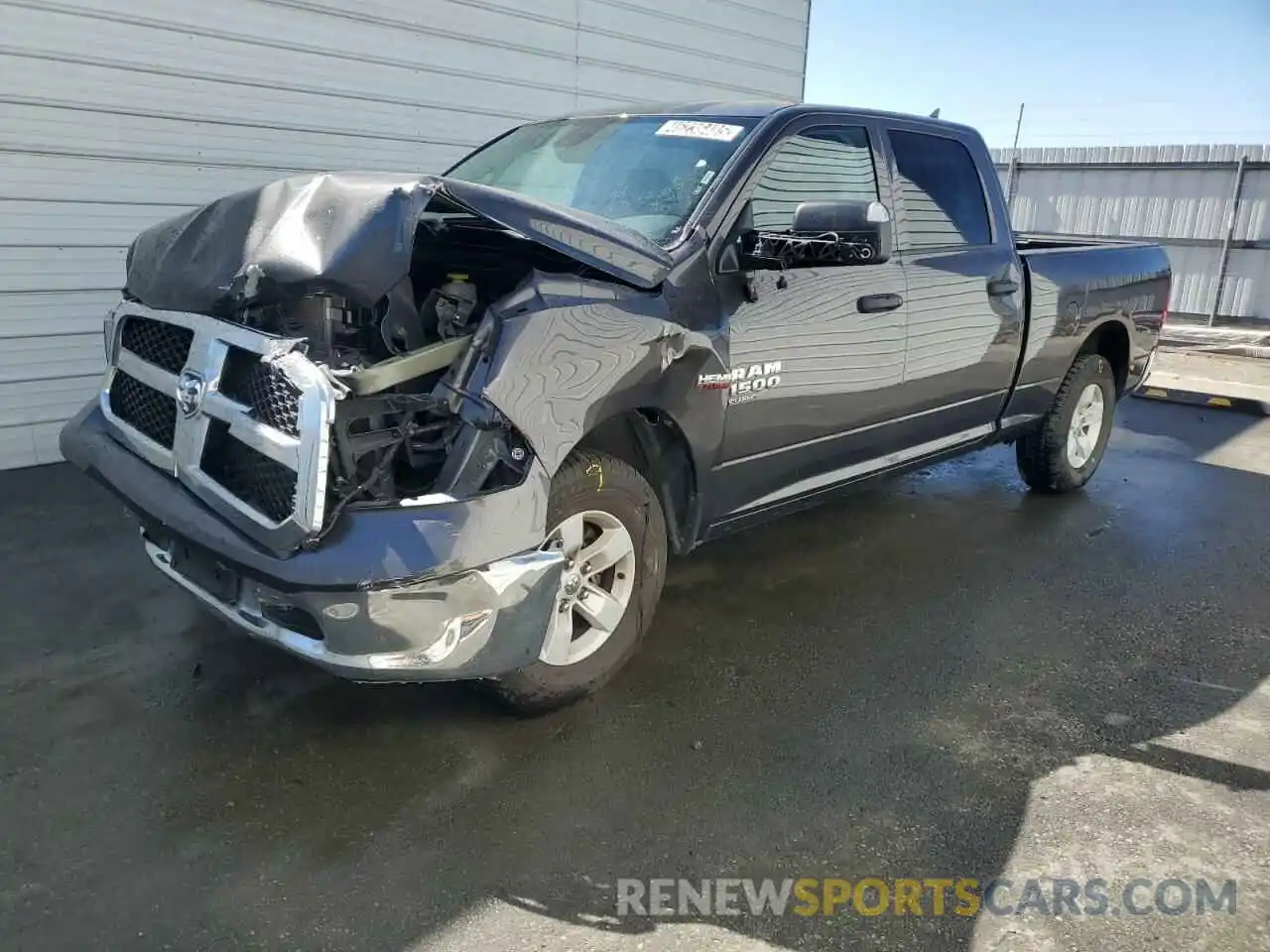 1 Photograph of a damaged car 1C6RR6TT1PS564672 RAM 1500 2023