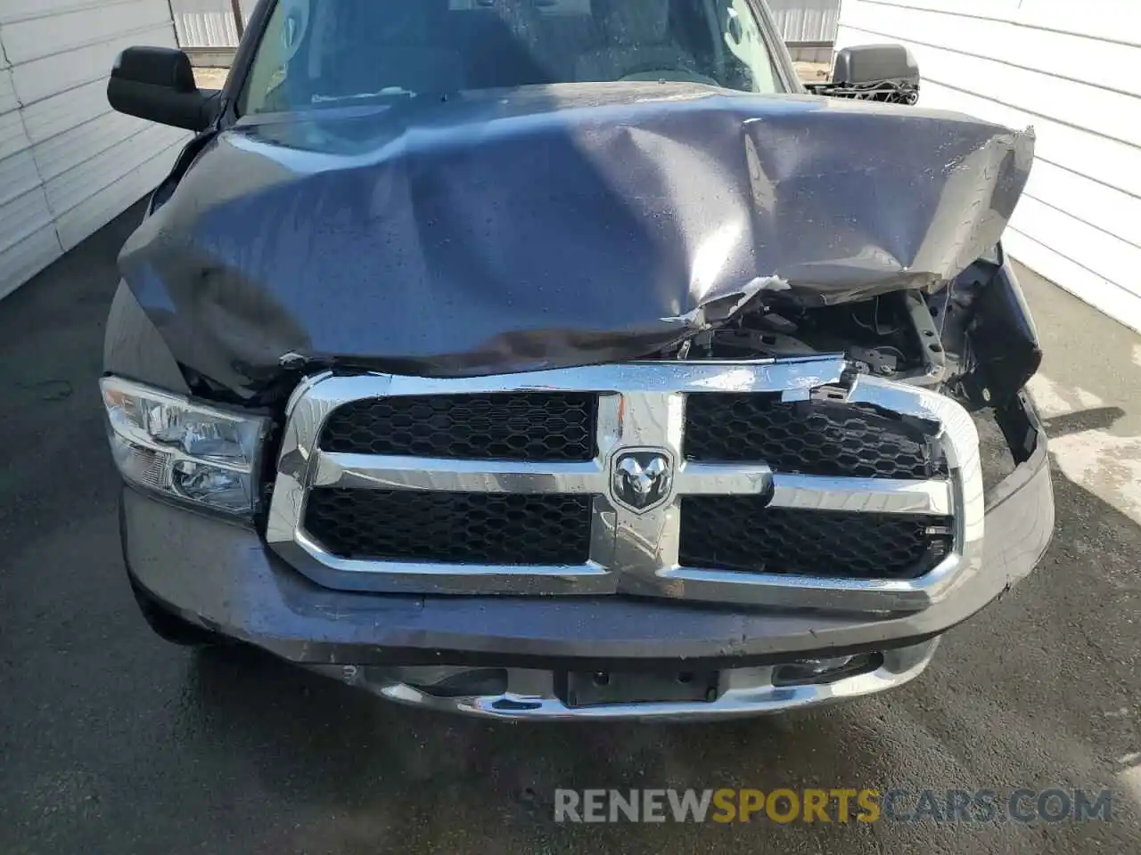 11 Photograph of a damaged car 1C6RR6TT1PS564672 RAM 1500 2023