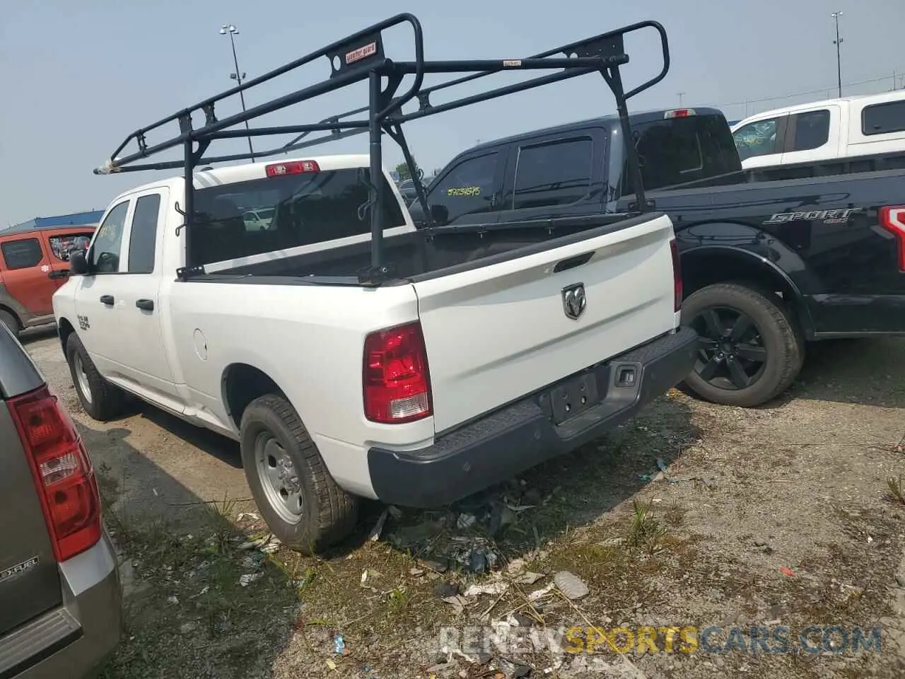 2 Photograph of a damaged car 1C6RR7FG3PS524260 RAM 1500 2023