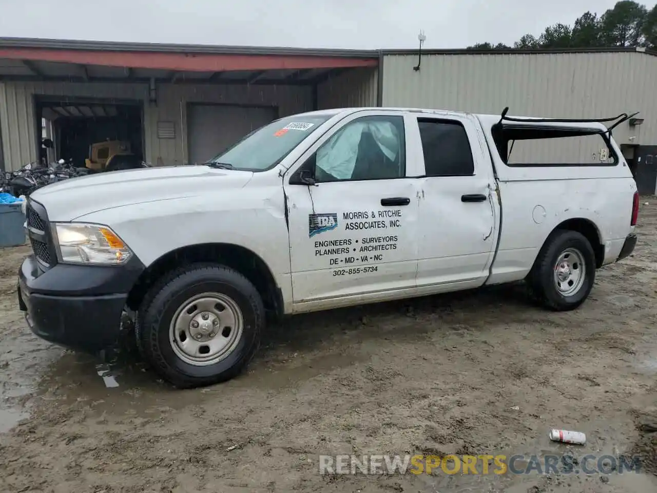 1 Photograph of a damaged car 1C6RR7FG7PS590407 RAM 1500 2023