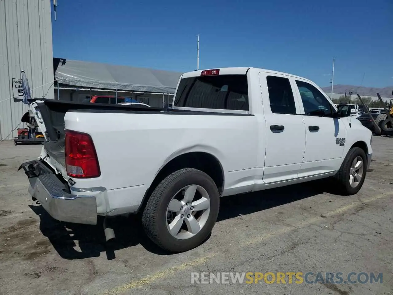 3 Photograph of a damaged car 1C6RR7FG8PS540065 RAM 1500 2023
