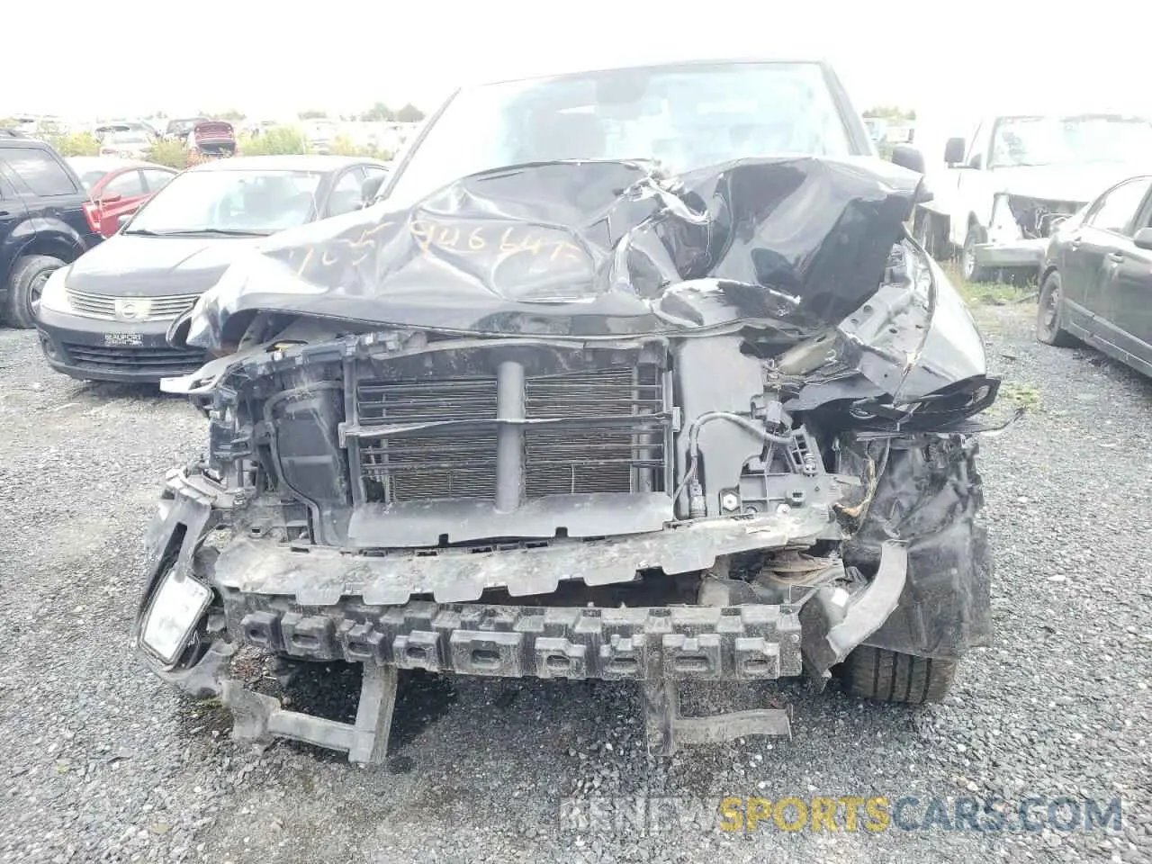 12 Photograph of a damaged car 1C6RR7FG8PS547985 RAM 1500 2023