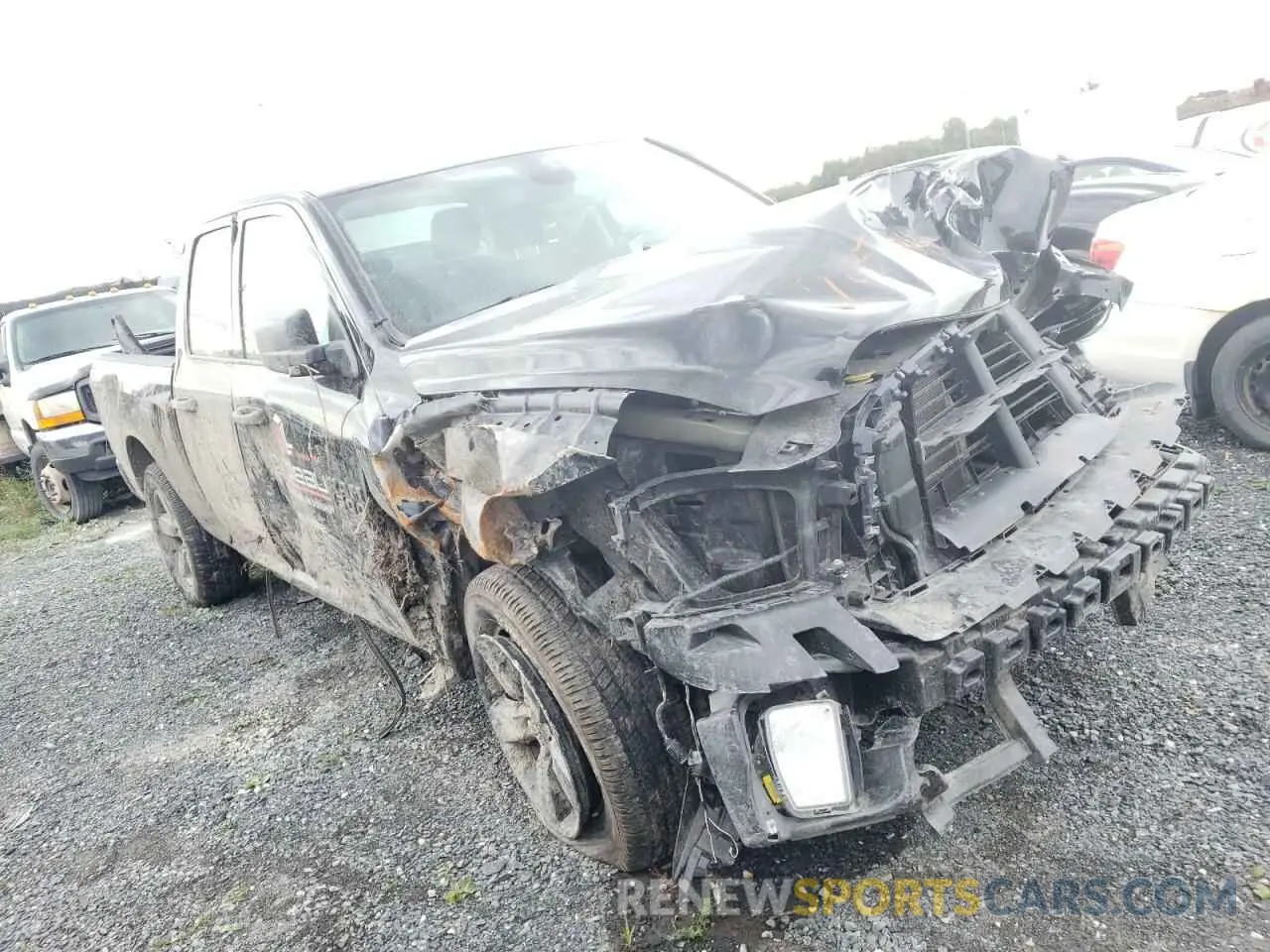 4 Photograph of a damaged car 1C6RR7FG8PS547985 RAM 1500 2023