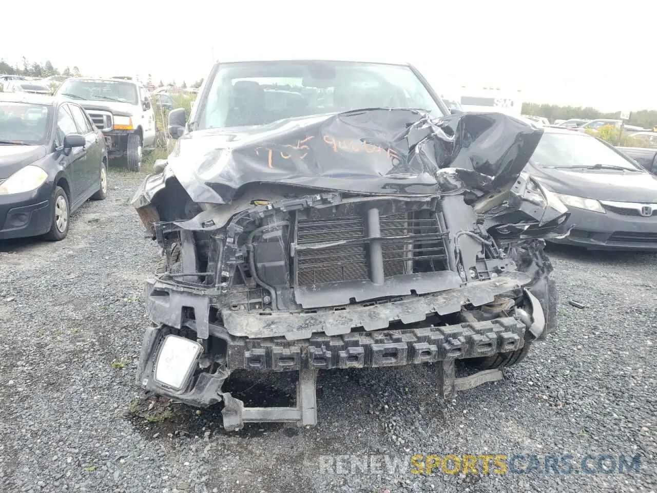 5 Photograph of a damaged car 1C6RR7FG8PS547985 RAM 1500 2023