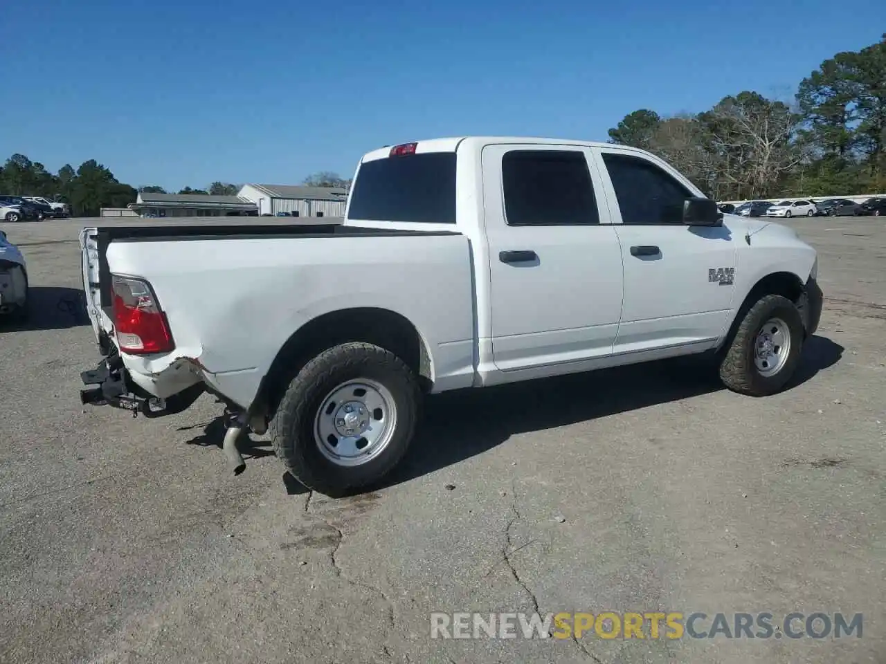 3 Photograph of a damaged car 1C6RR7KG0PS555066 RAM 1500 2023