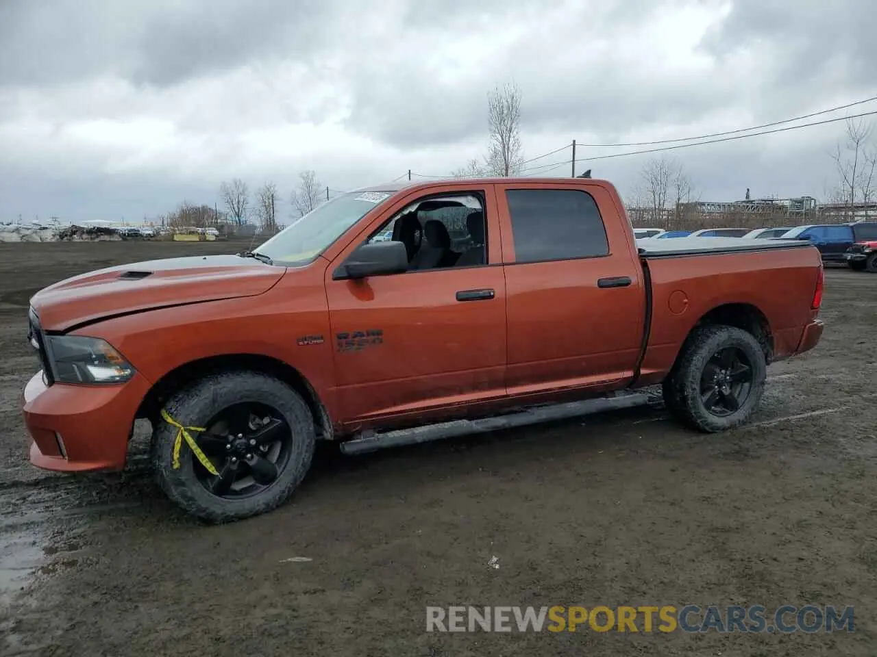 1 Photograph of a damaged car 1C6RR7KTXPS590064 RAM 1500 2023
