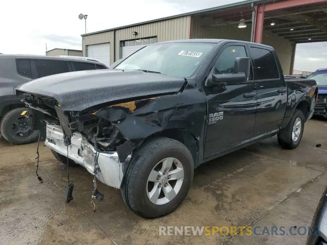 1 Photograph of a damaged car 1C6RR7LG0PS517187 RAM 1500 2023