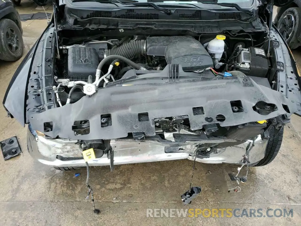 11 Photograph of a damaged car 1C6RR7LG0PS517187 RAM 1500 2023