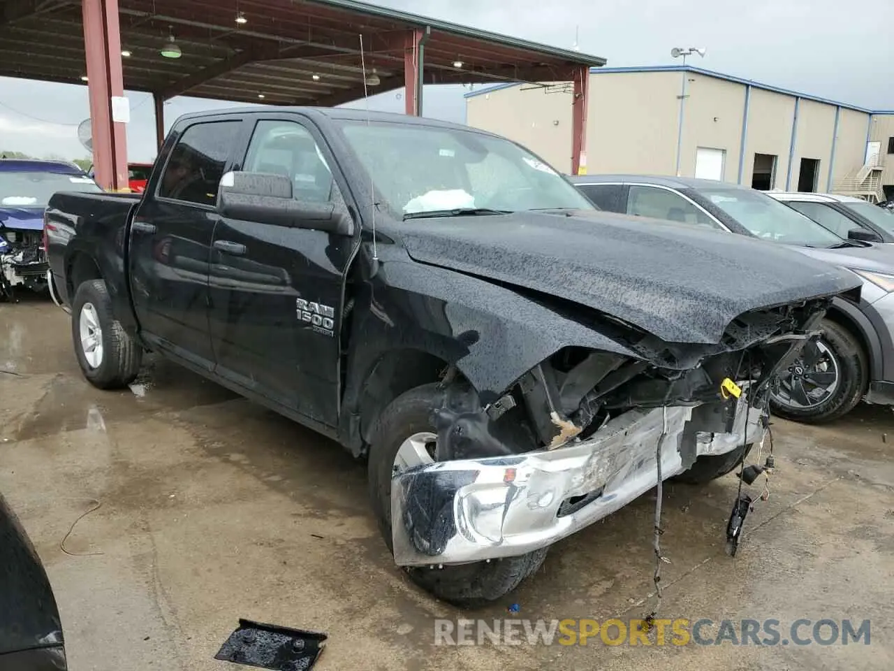 4 Photograph of a damaged car 1C6RR7LG0PS517187 RAM 1500 2023