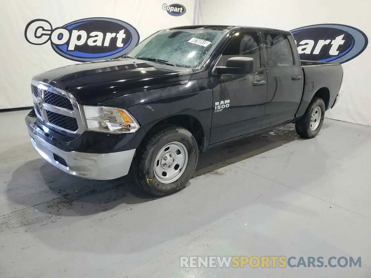 1 Photograph of a damaged car 1C6RR7LG1PS565734 RAM 1500 2023