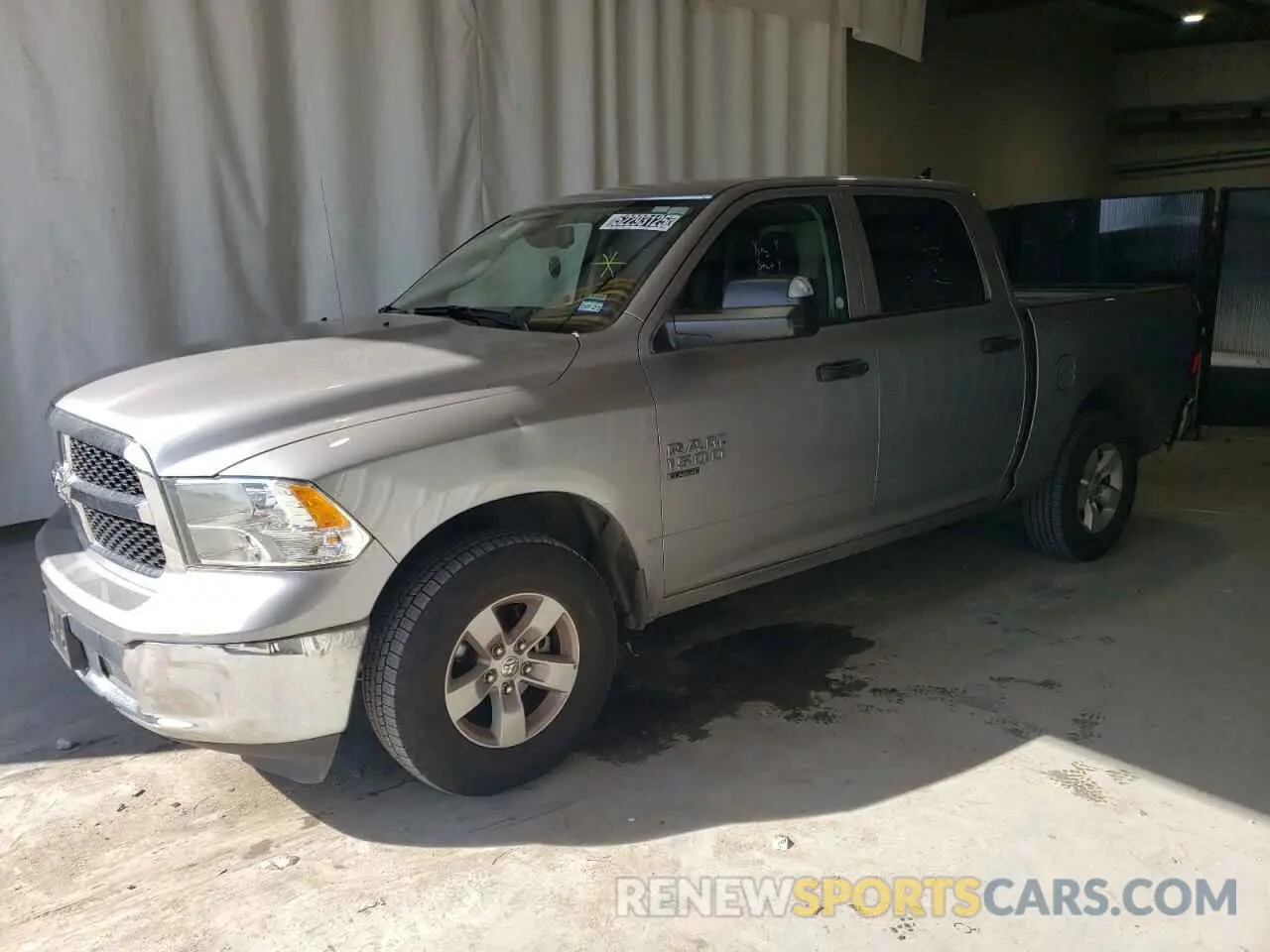 1 Photograph of a damaged car 1C6RR7LG4PS575335 RAM 1500 2023