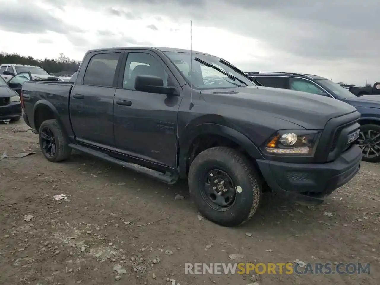 4 Photograph of a damaged car 1C6RR7LG6PS575157 RAM 1500 2023