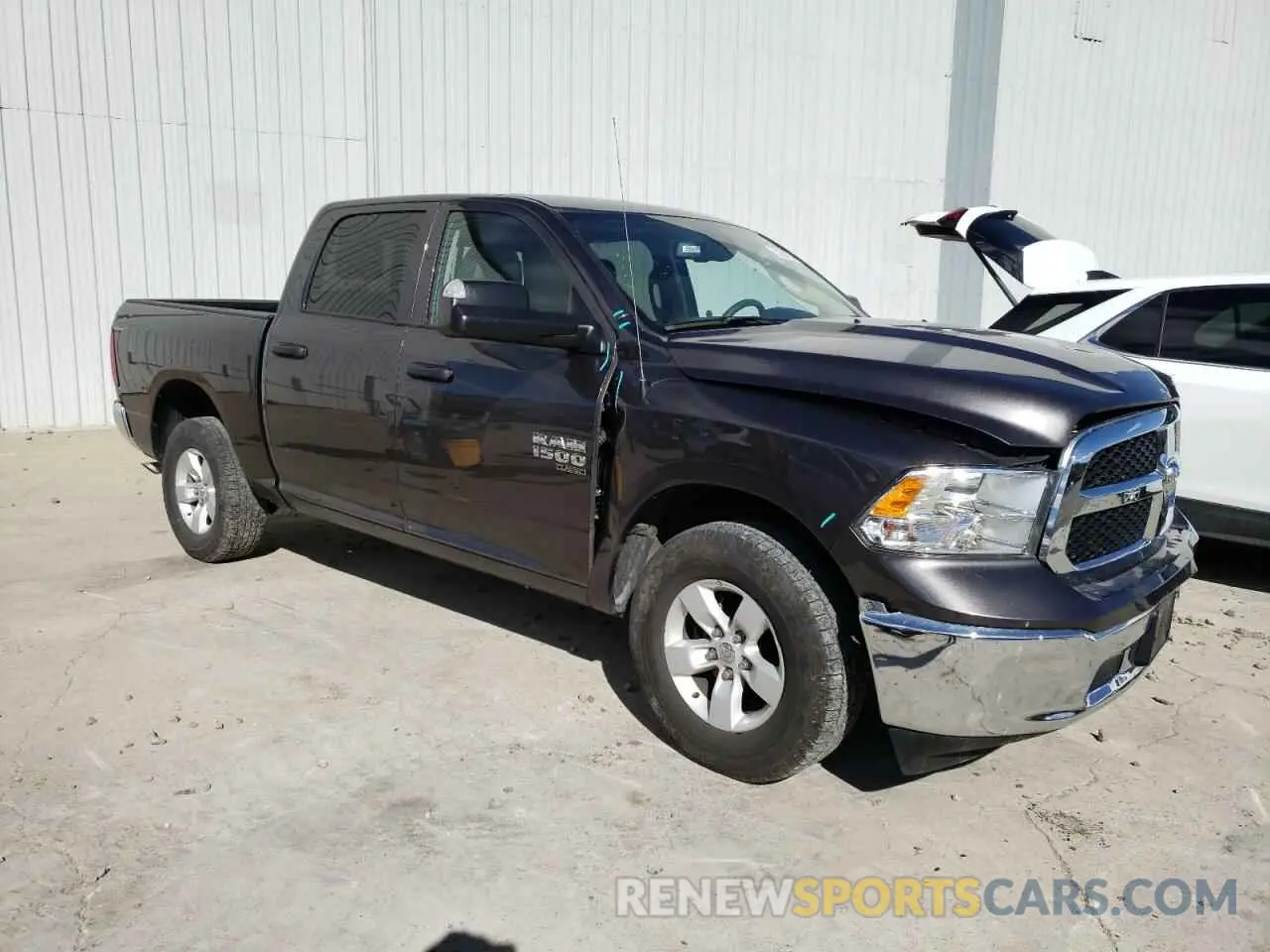 4 Photograph of a damaged car 1C6RR7LG9PS536840 RAM 1500 2023