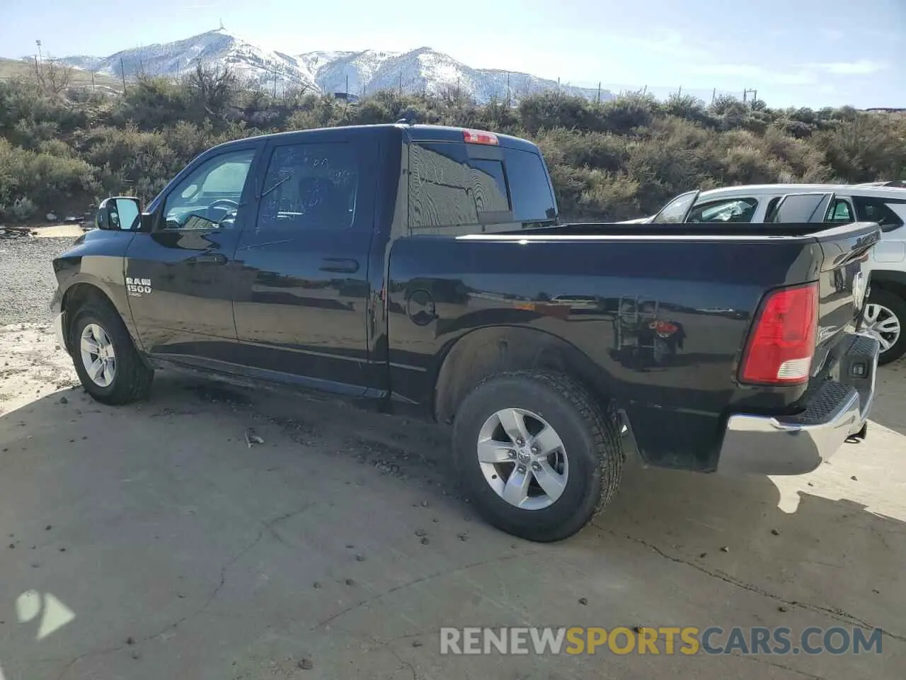 2 Photograph of a damaged car 1C6RR7LG9PS565383 RAM 1500 2023