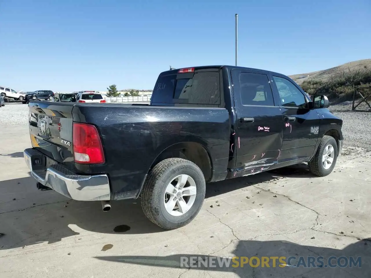 3 Photograph of a damaged car 1C6RR7LG9PS565383 RAM 1500 2023