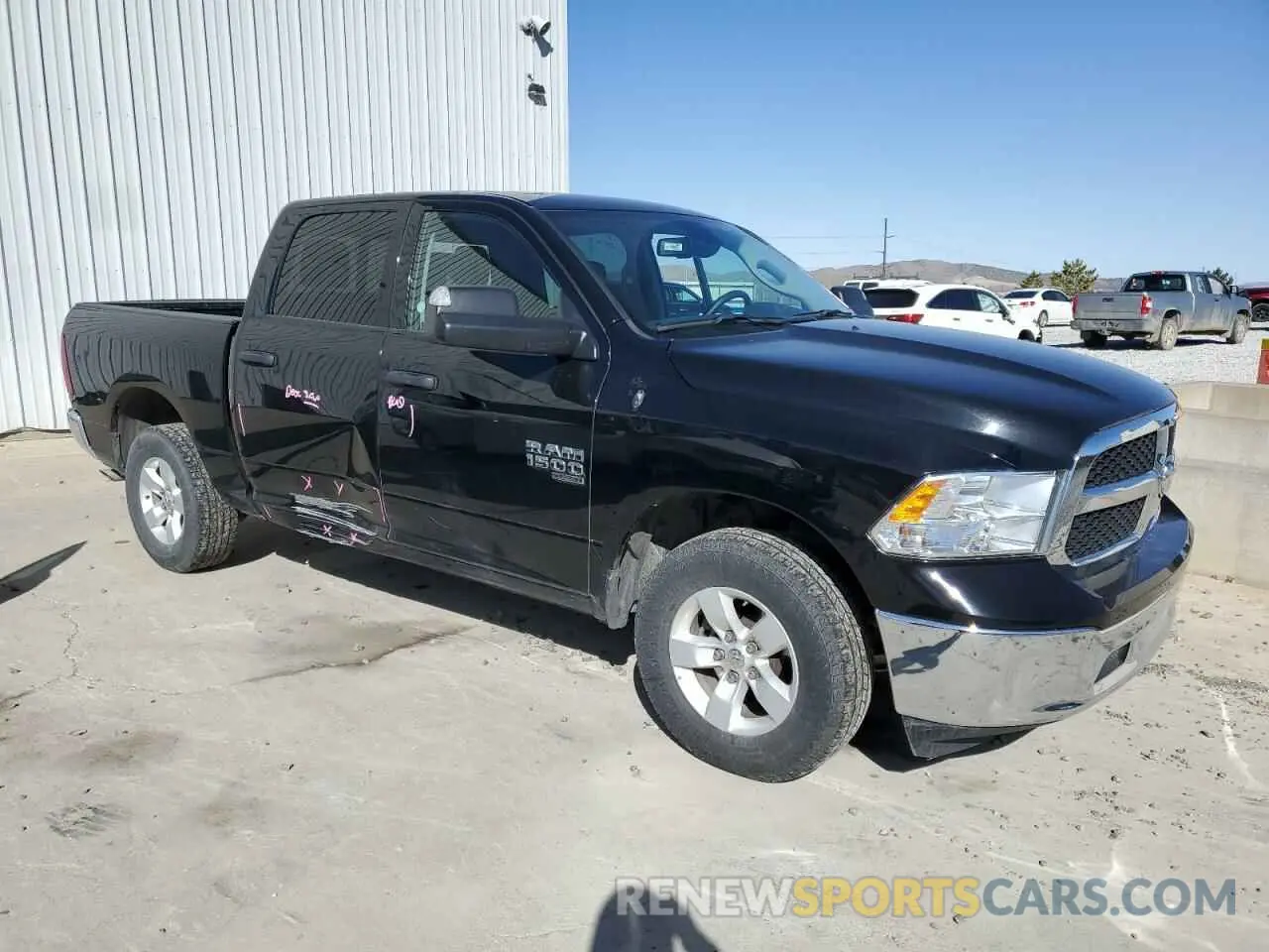 4 Photograph of a damaged car 1C6RR7LG9PS565383 RAM 1500 2023