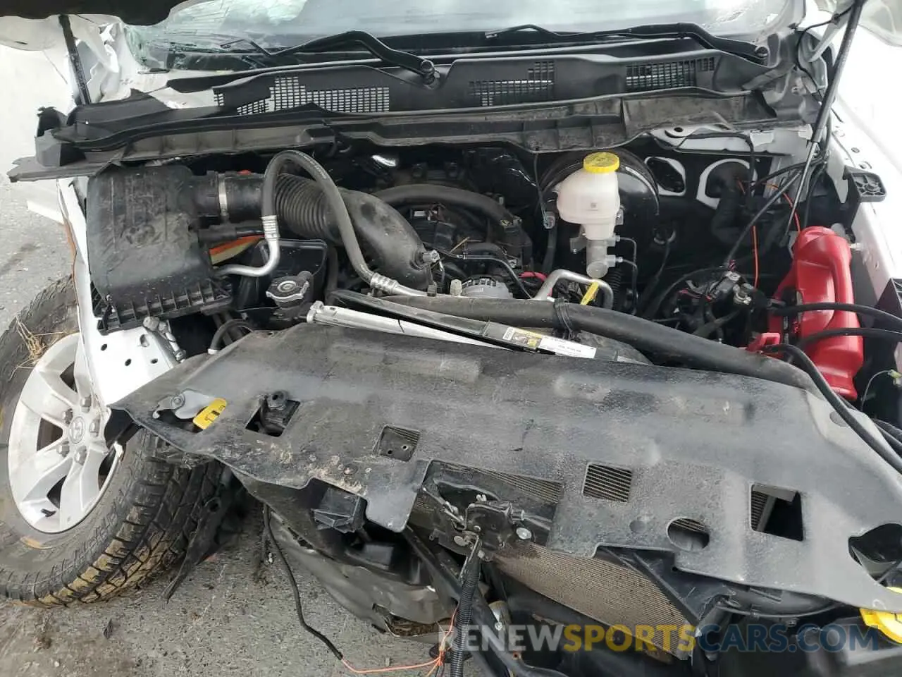 11 Photograph of a damaged car 1C6RR7XT3PS581893 RAM 1500 2023