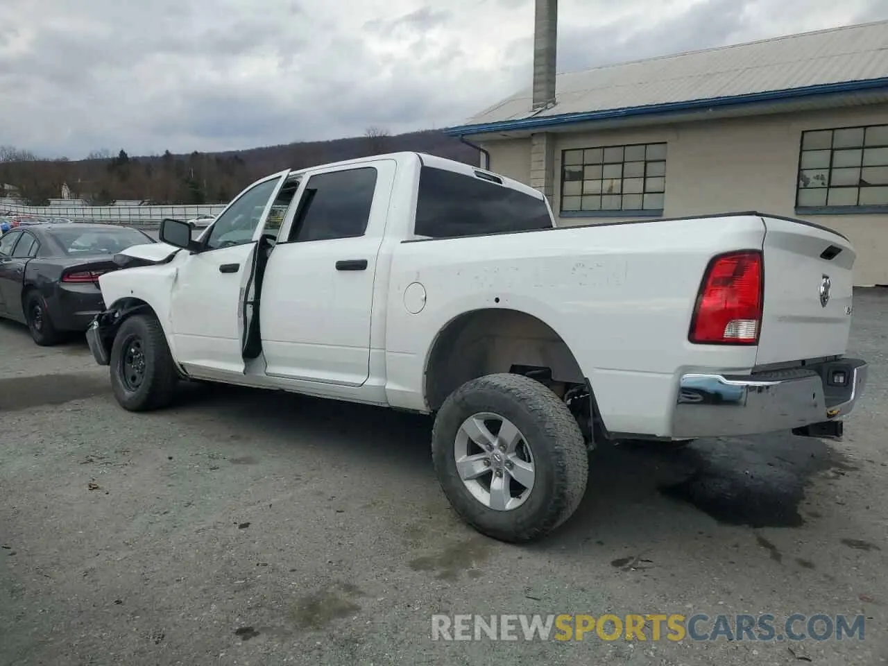 2 Photograph of a damaged car 1C6RR7XT3PS581893 RAM 1500 2023