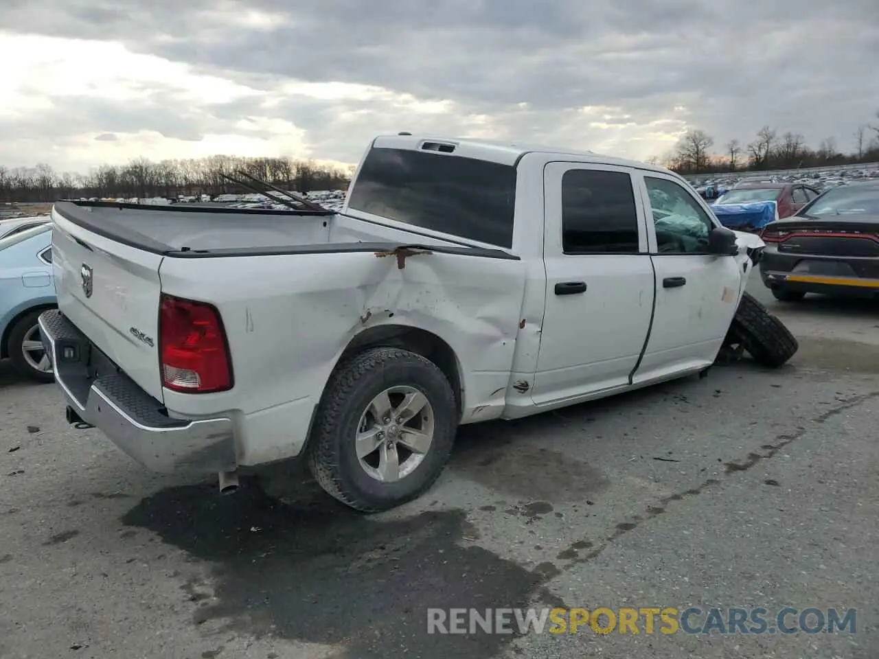 3 Photograph of a damaged car 1C6RR7XT3PS581893 RAM 1500 2023