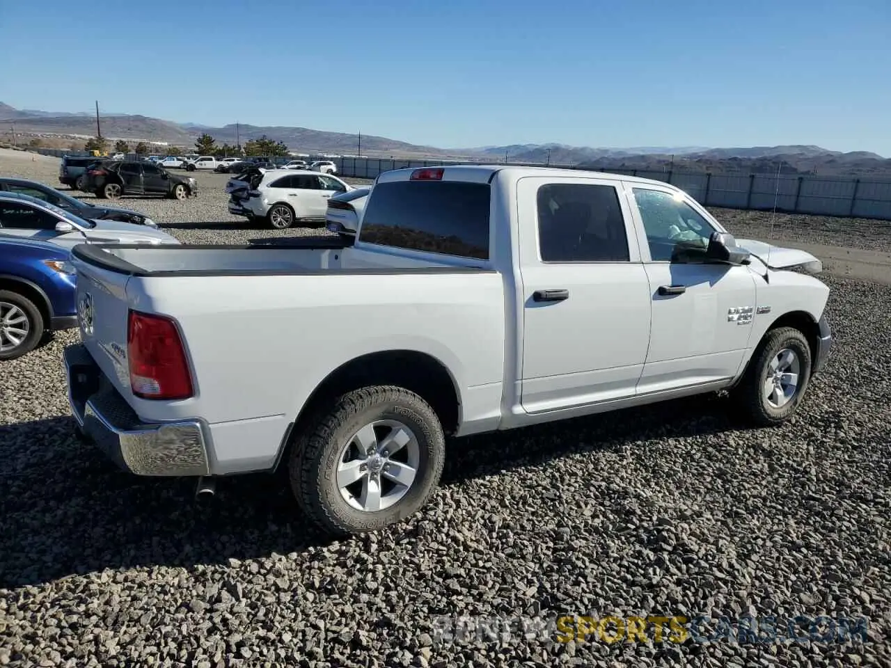 3 Photograph of a damaged car 1C6RR7XT8PS566273 RAM 1500 2023