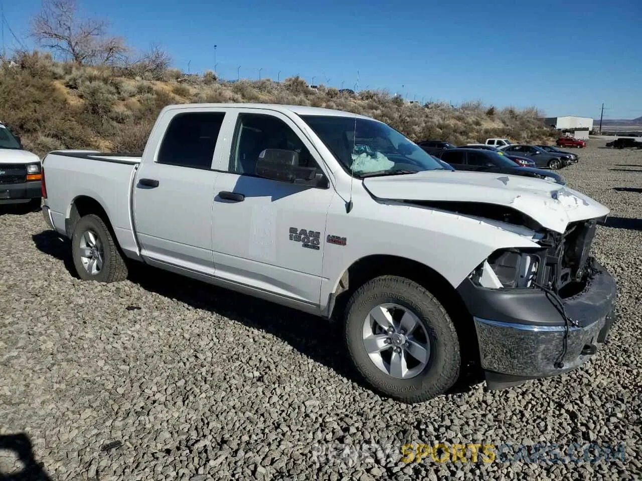 4 Photograph of a damaged car 1C6RR7XT8PS566273 RAM 1500 2023