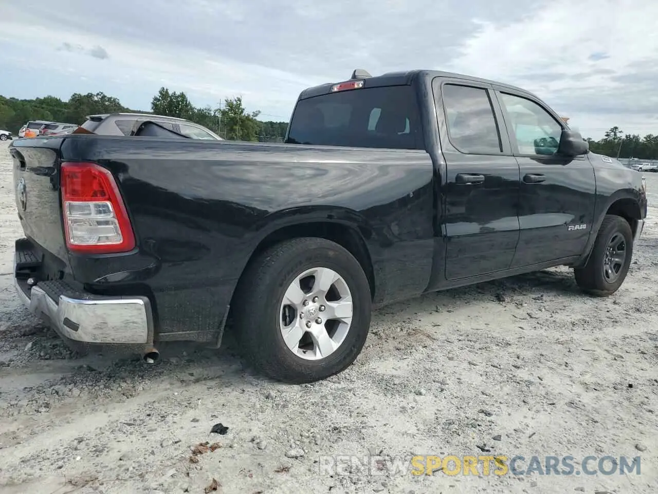 3 Photograph of a damaged car 1C6RREBG4PN608354 RAM 1500 2023