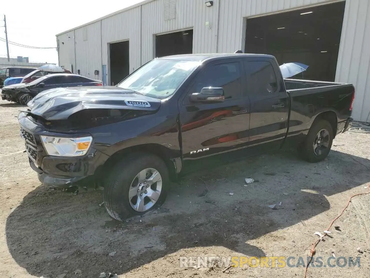 1 Photograph of a damaged car 1C6RREBG5PN604331 RAM 1500 2023
