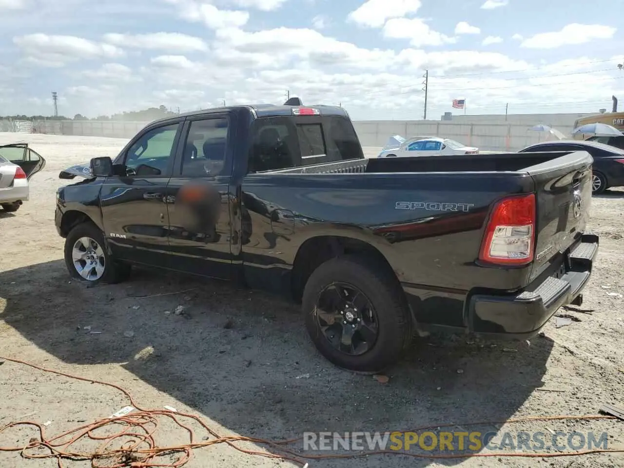 2 Photograph of a damaged car 1C6RREBG5PN604331 RAM 1500 2023