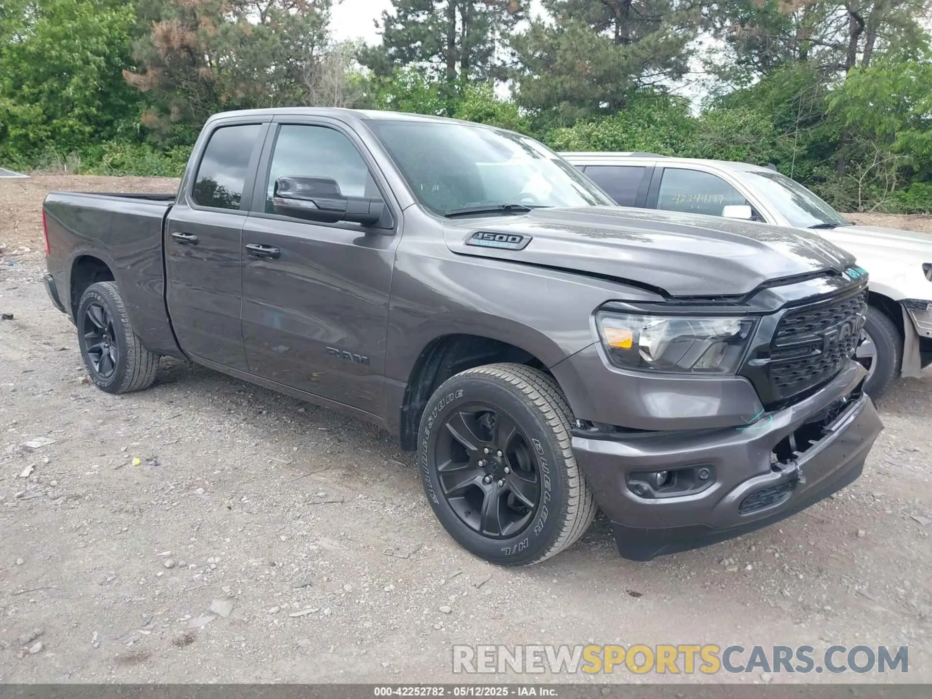 1 Photograph of a damaged car 1C6RREBG6PN585787 RAM 1500 2023