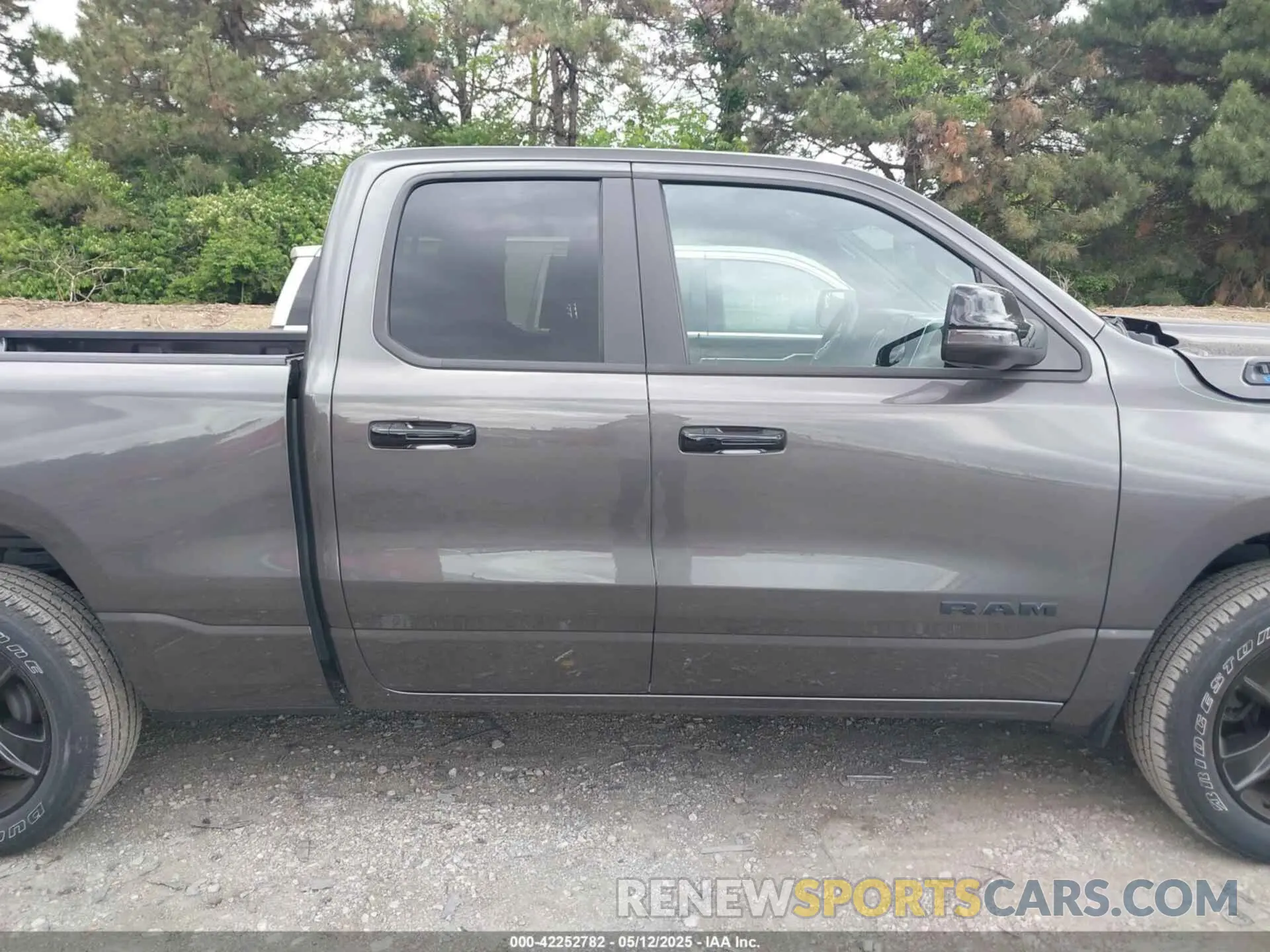 13 Photograph of a damaged car 1C6RREBG6PN585787 RAM 1500 2023