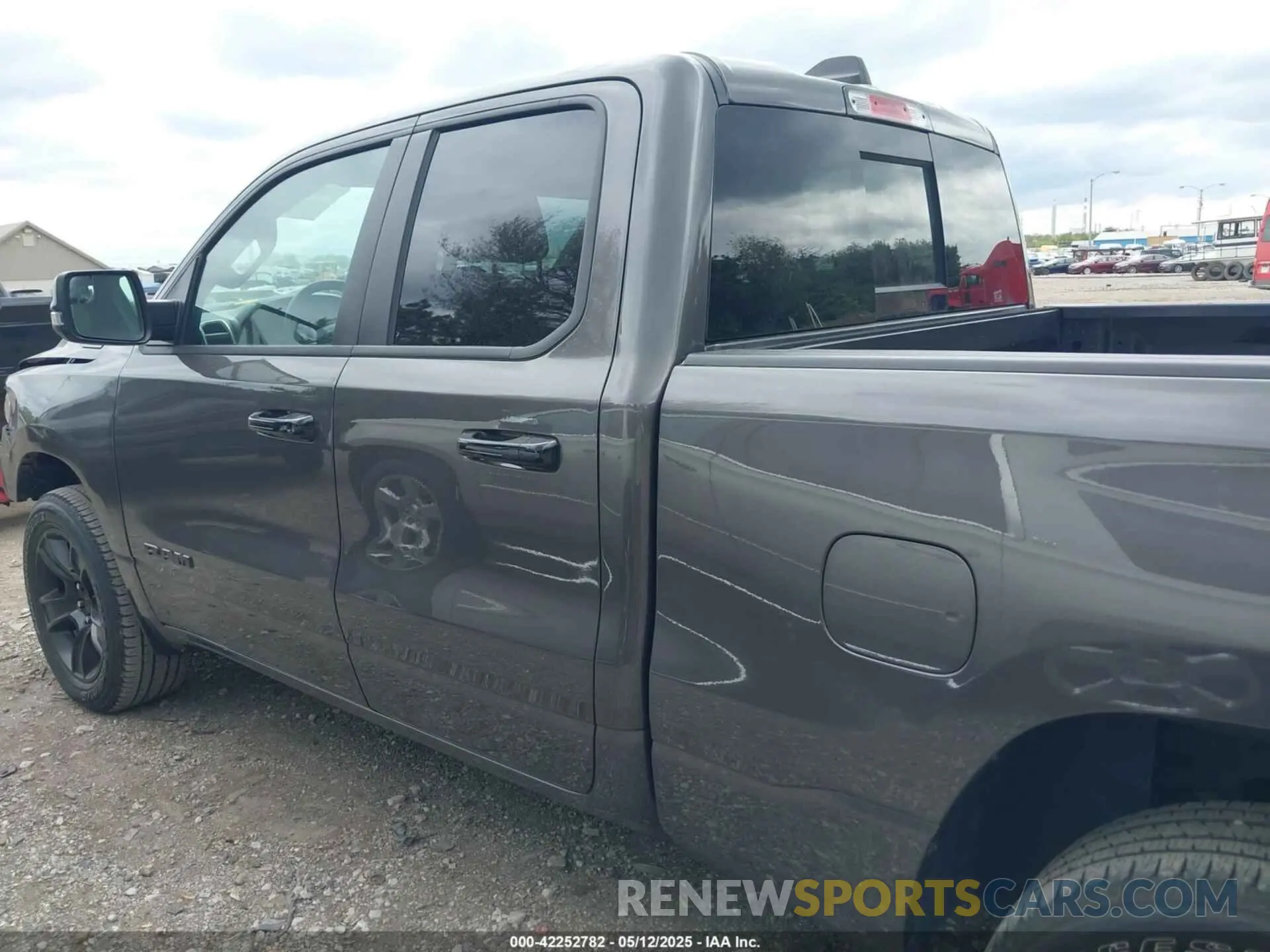 14 Photograph of a damaged car 1C6RREBG6PN585787 RAM 1500 2023