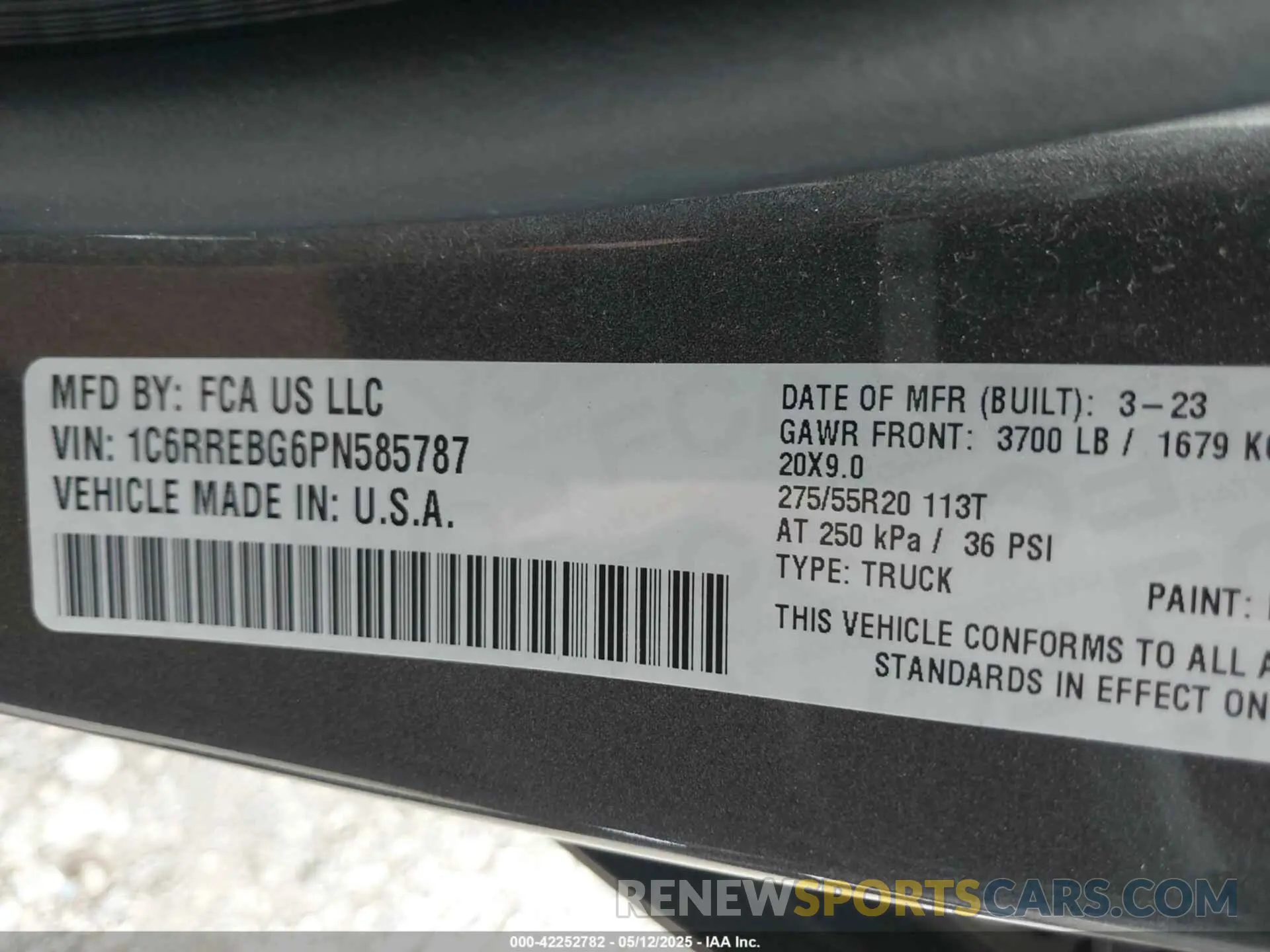 9 Photograph of a damaged car 1C6RREBG6PN585787 RAM 1500 2023